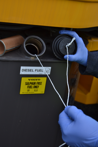 A retrieval line is attached to the Aqua-Zorb absorbent cell in a fuel tank.