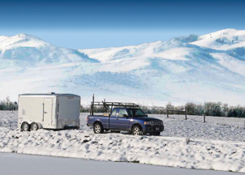 A winter view of the mobile disinfection unit on site, with the Rocky Mountains in the background.