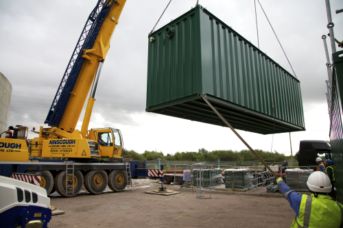 The second SAF module is lowered into position using a Hiab crane.