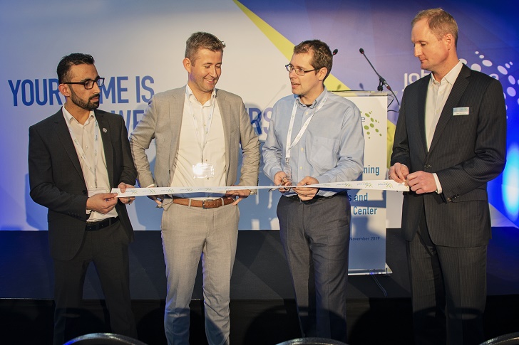 Left to right: Esmatullah Az imi, After Sales Technician (John Crane); Benjamin Nys, Sales Manager Belgium (John Crane); Lieven Van Belleghem, Reliability Engineer, Expertise Process Machinery (BASF); and Nico Schmaeling, Vice President Sales Europe (John Crane), cut the ribbon to officially open John Crane’s new Antwerp facility.