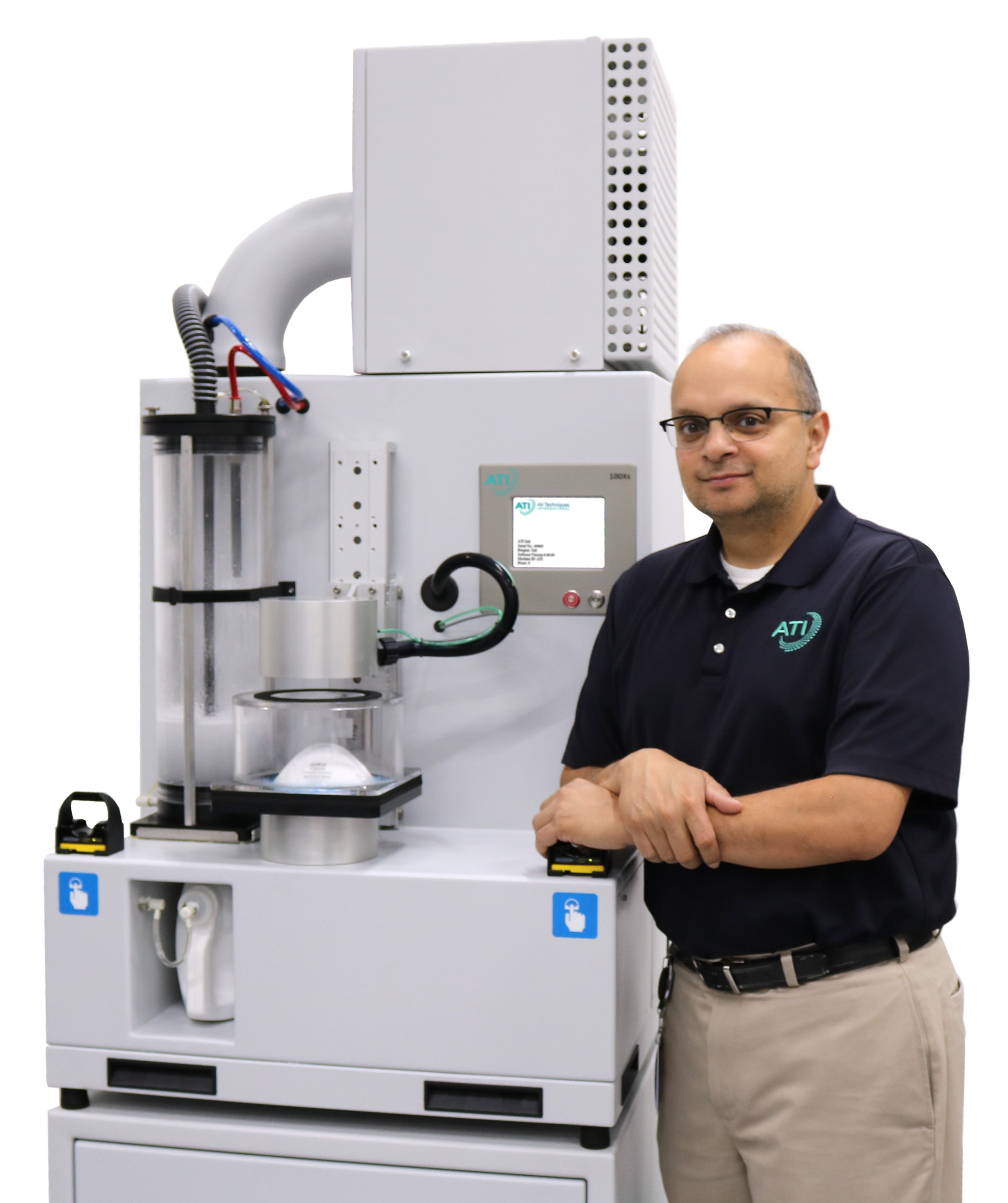 ATI's global product manager, Gautam Patel with the 100X automated filter tester and mask test adapter.