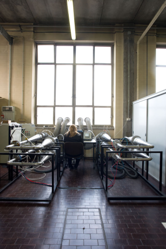 Transportable test system for on-site simultaneous comparisons of four air filter media. Ambient aerosol is being sampled here.