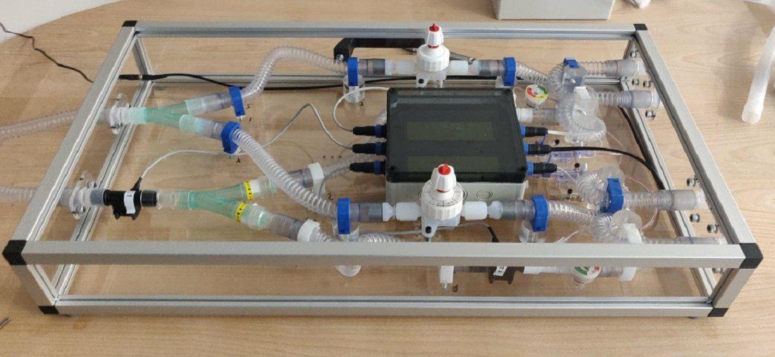 The device makes it possible to split the airflow from one ventilator, allowing two patients to receive tailored respiratory support. (Image: Institute for Manufacturing/Royal Papworth Hospital)