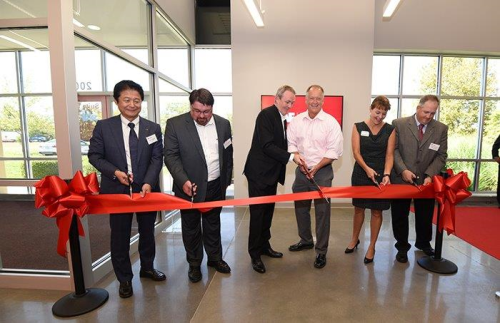 Cutting the ribbon at the opening of AAF's new Clean AIR Centre in Jeffersonville, Indiana, USA.