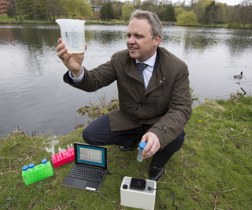 Professor John Bridgeman is pictured with the ‘Duo Fluor’ device, which reveals unsafe sources of drinking water in less than 30 seconds (credit: John James).