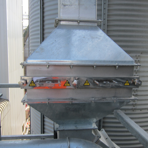 The housed grid magnet was installed to remove fine metal and para magnetic contamination from the grain.