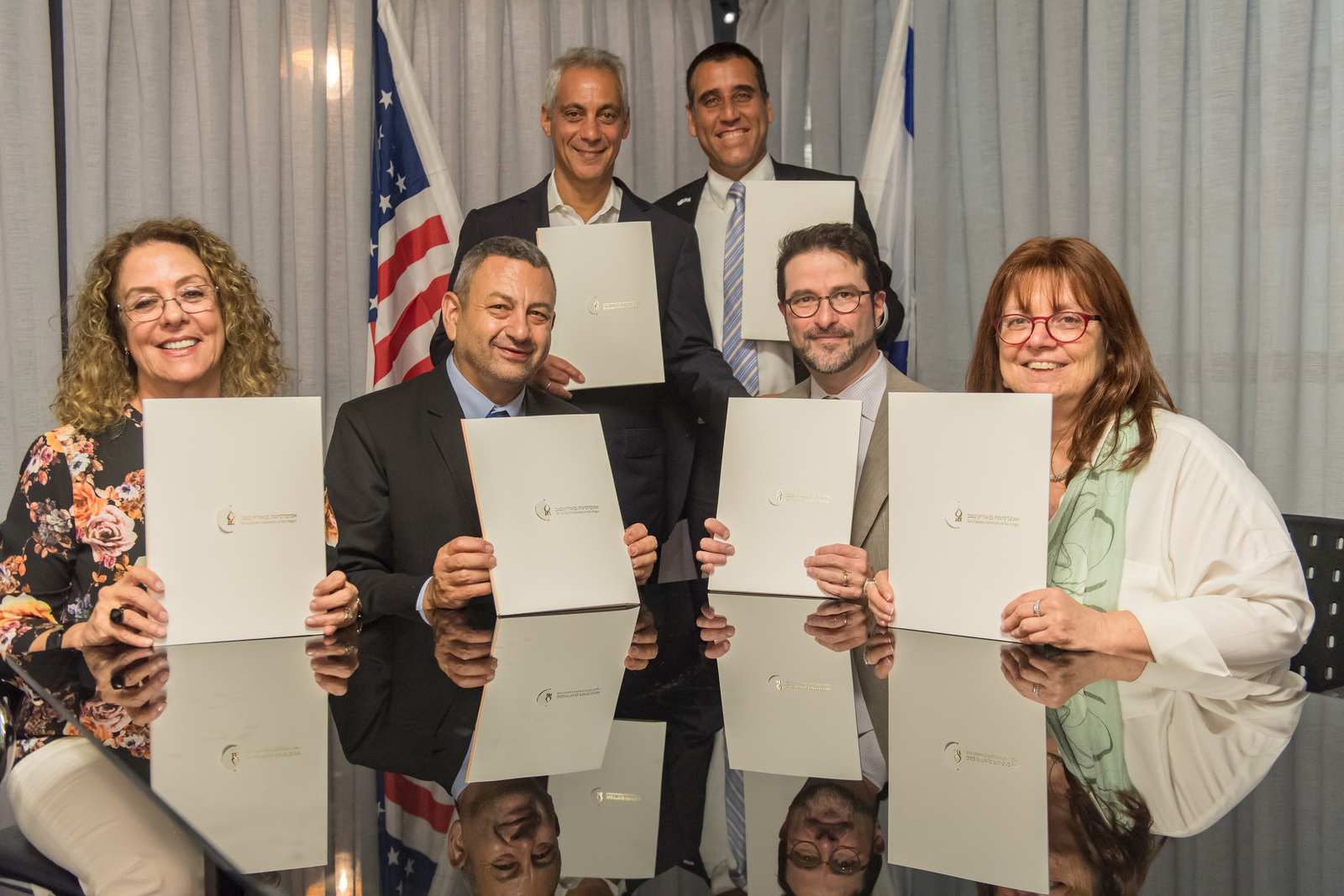 Chicago Mayor Rahm Emanuel (top left) and Aviv Ezra, consul general of Israel to the Midwest (top right) witnessed the signing. Left to right: BGU President Prof. Rivka Carmi; Prof. Dan Blumberg, BGU’s vice president and dean for research and development; Prof. Aaron Packman of NU’s Department of Civil and Environmental Engineering and director of the Center for Water Research; and Prof. Fruma Yehiely, NU associate vice president for research.