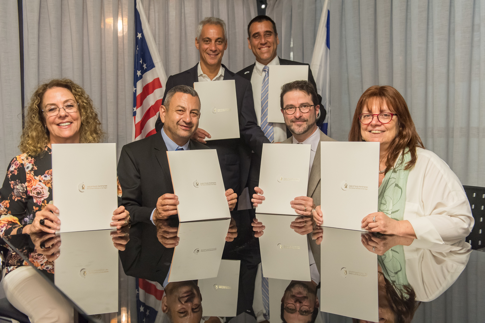 Chicago Mayor Rahm Emanuel (top left) and Aviv Ezra, consul general of Israel to the Midwest (top right) witnessed the signing. Left to right: BGU President Prof. Rivka Carmi; Prof. Dan Blumberg, BGU’s vice president and dean for research and development; Prof. Aaron Packman of NU’s Department of Civil and Environmental Engineering and director of the Center for Water Research; and Prof. Fruma Yehiely, NU associate vice president for research.