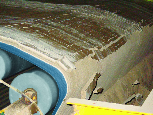 Dewatered gypsum is removed from the belt. (Courtesy of GKD)