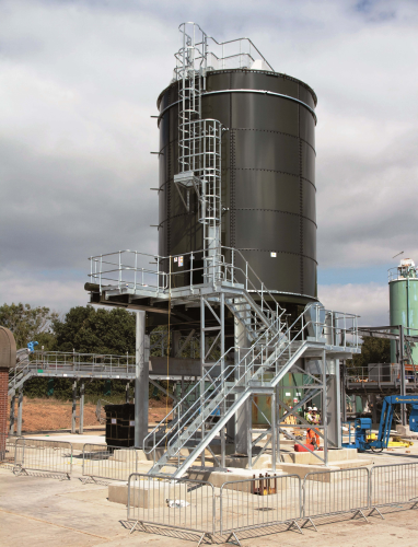 The raised storage silos allow de-watered sludge to be directly loaded into trucks.