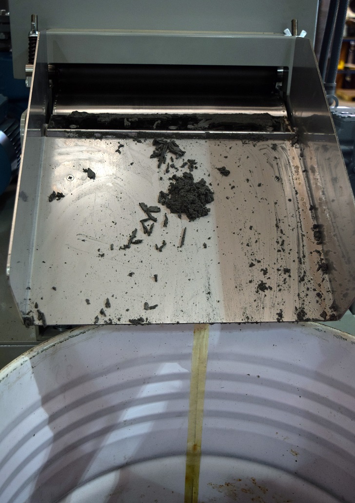 The swarf material that was removed from the machine was saturated with oil and OSL Cutting Technologies had to pay for its removal and disposal.
