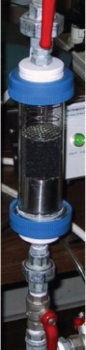 Figure 2. Test section for measuring the performance of loose granular media according to ASHRAE 145.1 standard.