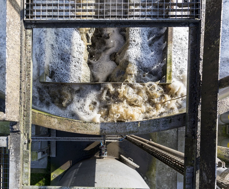 Filter backwashing at a wastewater treatment plant.