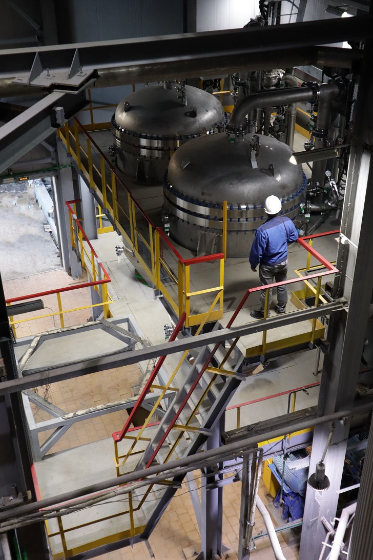 A BHS service engineer inspects the two simultaneously operated tube sheet candle filters in Amursk, Russia. (Image: BHS)