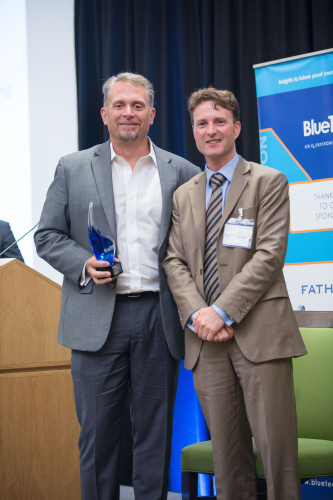 Paul O’Callaghan, chief executive of BlueTech Research, presents Trevor Hill, chairman and chief Executive of Fathom, with the Blue Truffle Award at BlueTech Forum.