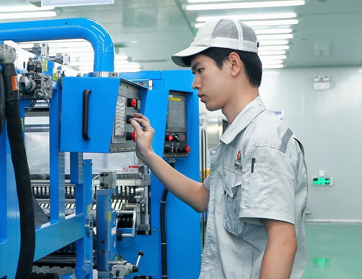 Production at Apollo Air-cleaner Co's plant in Shunde, China.