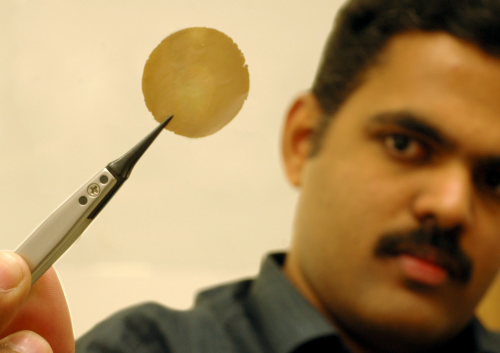 Dr Nair shows his research sample: one micron thick graphene oxide film.